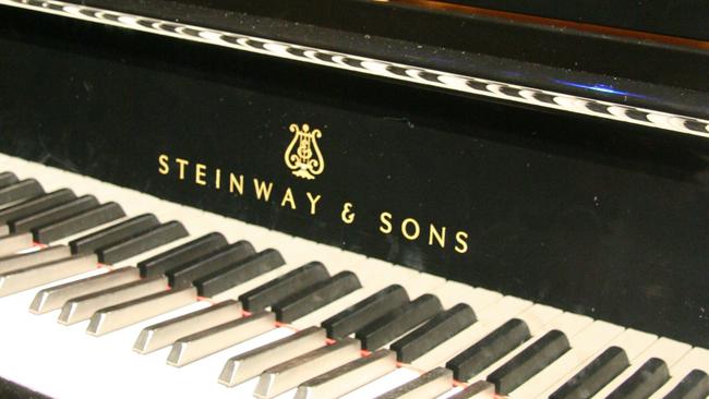 A plaque inside the piano says: This piano was presented to the Citizens of Rockhampton jointly by the Rockhampton Musical Union and the Rockhampton City Council.