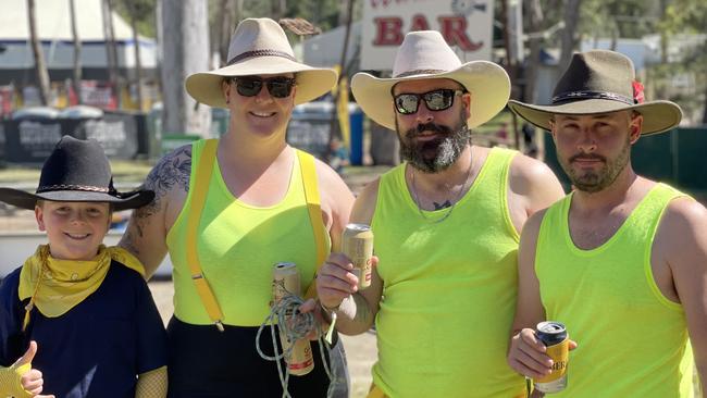 Logan Green, Riordan Green, Tim Orr and Tim McMahon, from Canberra, enjoy day one of the 2024 Gympie Muster, at the Amamoor State Forest on August 22, 2024.