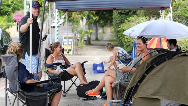 Parents waiting outside Ascot State School. Picture: Jack Tran