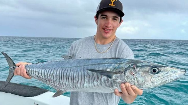 08/09/2022 – Marcus Salerno with a Spanish mackerel caught on local charter boat the Sheriff off Cairns Picture: Robert Erskine