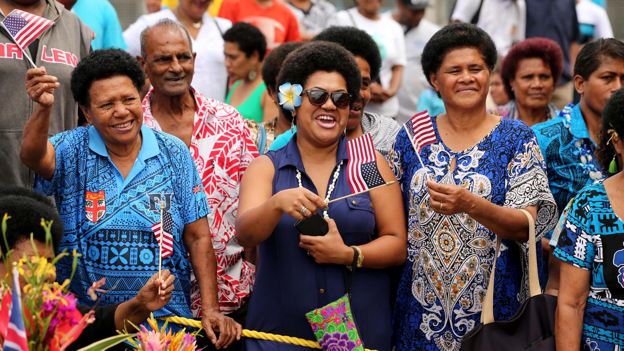 Fijians celebrate on the streets the tour of the Duke and Duchess of Sussex. Picture: Nathan Edwards.