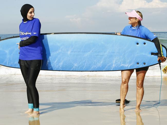 Surf instructor Brenda Miley says the salt water is always a good leveller. Picture: John Appleyard