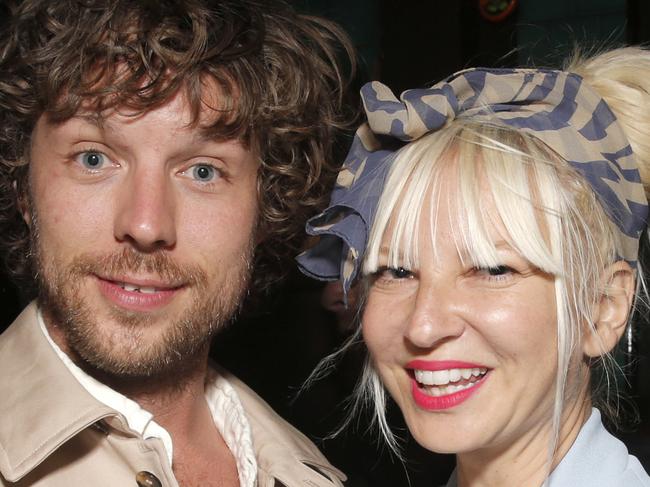 FILE - In this Aug. 7, 2014 file photo, filmmaker Erik Anders Lang, left, and singer Sia attend the after party for the premiere of 