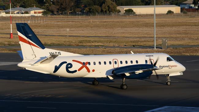 Regional Express has cancelled all Queensland flights, as it becomes the latest victim of coronavirus travel bans. (AAP/Emma Brasier)