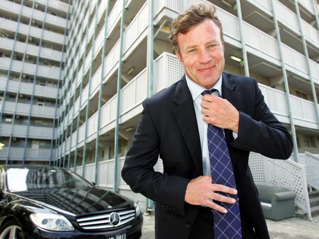 James Dack, the multi-millionaire sales director of McGrath Real Estate, at the housing commission estate unit block in Sydney where he lived as a boy.