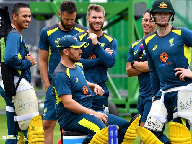 Australia's Usman Khawaja (L), Australia's captain Aaron Finch (3L), Australia's David Warner (C) and Australia's Steve Smith (2R) attend a training session at Lord's Cricket Ground in London on June 24, 2019, ahead of their 2019 Cricket World Cup group stage match against England. (Photo by Saeed KHAN / AFP) / RESTRICTED TO EDITORIAL USE