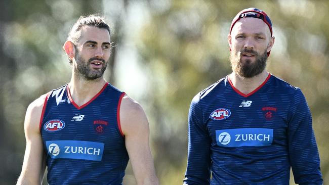 MELBOURNE, AUSTRALIA - SEPTEMBER 04: Brodie Grundy and Max Gawn of the Demons chat during a Melbourne Demons AFL training session at Casey Fields on September 04, 2023 in Melbourne, Australia. (Photo by Quinn Rooney/Getty Images)