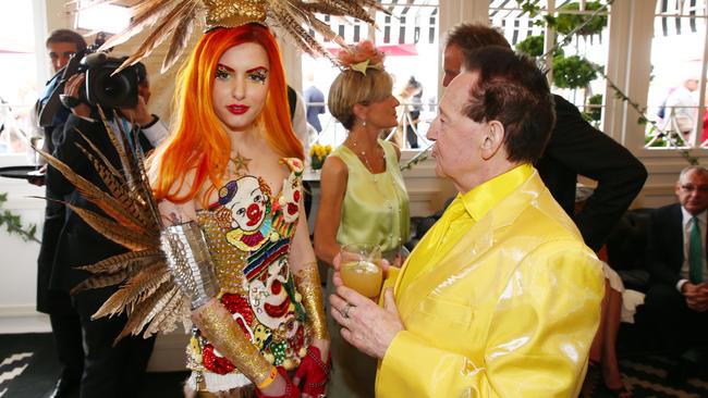 Geoffrey Edelsten and Gabi Grecko in the Birdcage at Flemington Racecourse during the Melbourne Cup last year.