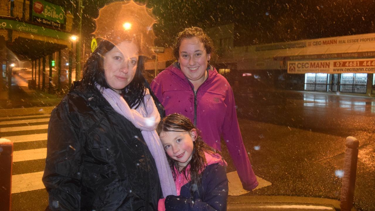 Georgia Holmes, Nadine Clayton and Abby Kliendienst brave the snow very early of July 17, 2015 in Stanthorpe. Photo: Alex Nolan / Stanthorpe Border Post