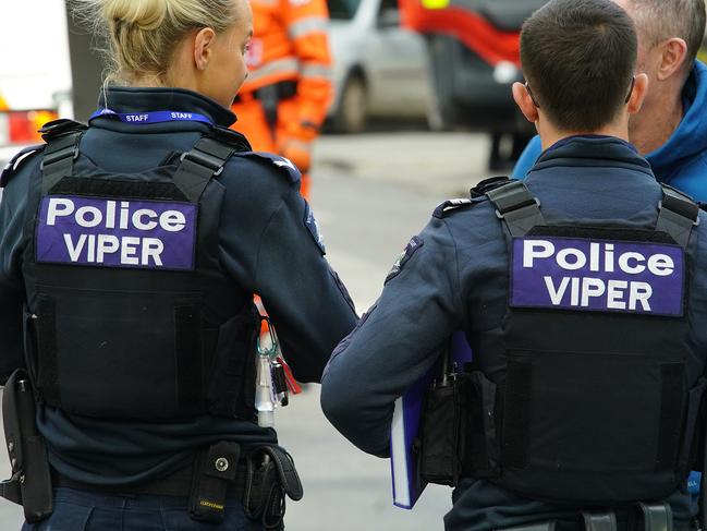 MELBOURNE AUSTRALIA - NewsWire Photos AUGUST 5, 2023: Police belonging to the Victoria Police VIPER Taskforce (tactical and investigative unit  targeting criminal activities of groups such as outlaw motorcycle gangs, organised crime networks and street gang) are seen at the site of a shooting in South Yarra.Picture: NCA NewsWire / Luis Enrique Ascui