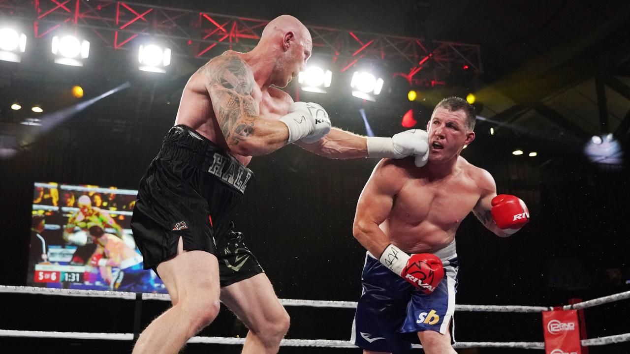 Paul Gallen and Barry Hall compete during the Code War Boxing night at Margaret Court Arena in Melbourne, Friday, November 15, 2019. (AAP Image/Michael Dodge)