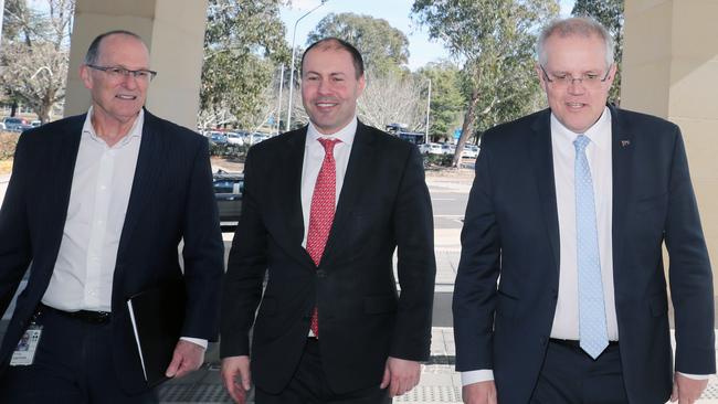 Secretary of Treasury Philip Gaetjens (left) with Treasurer Josh Frydenberg and Prime Minister Scott Morrison in Canberra. Photo: Gary Ramage