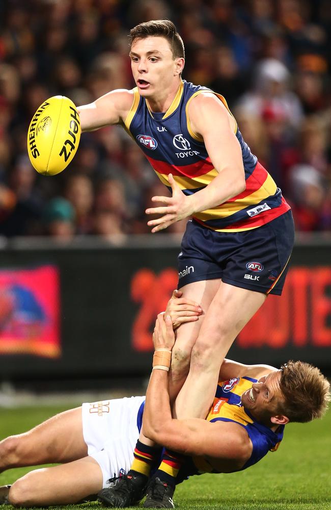 Mark LeCras tackles Jake Lever. (Photo by Morne de Klerk/Getty Images)