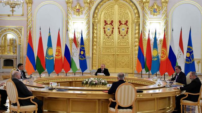 (L-R clockwise) Kazakhstan's President Kassym-Jomart Tokayev, Kyrgyzstan's President Sadyr Japarov, Russian President Vladimir Putin, Tajikistan's President Emomali Rakhmon, Armenian Prime Minister Nikol Pashinyan, Stanislav Zas, Secretary General of the Collective Security Treaty Organization (CSTO), and Belarus' President Alexander Lukashenko hold a CSTO leaders meeting. Picture: AFP.