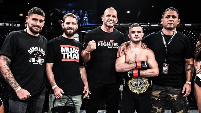 Sean Gauci and his Dominance MMA team after being crowned the Hex Bantamweight Champion.