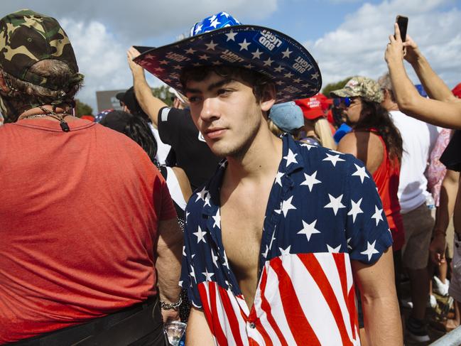 The crowd at Mr Trump’s rally in Tampa, Florida, was mostly maskless. Picture: Angus Mordant