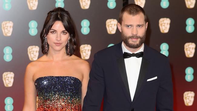 Amelia Warner and Jamie Dornan attend the British Academy Film Awards in London. (Photo by Chris Jackson/Getty Images).