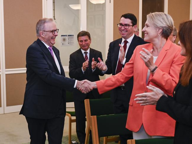 Mr Albanese shakes hands with Tanya Plibersek at the caucus meeting. Picture: NewsWire / Martin Ollman
