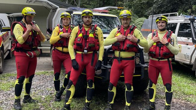 Swift water rescue teams from QFES prepare for the extraction of a man's body from the South Johnstone River. Picture: Alison Paterson