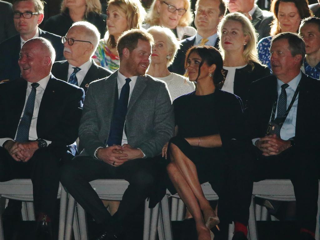 Prince Harry couldn’t take his eyes off his wife Meghan as the opening ceremony of the Invictus Games got under way. Picture: Toby Zerna