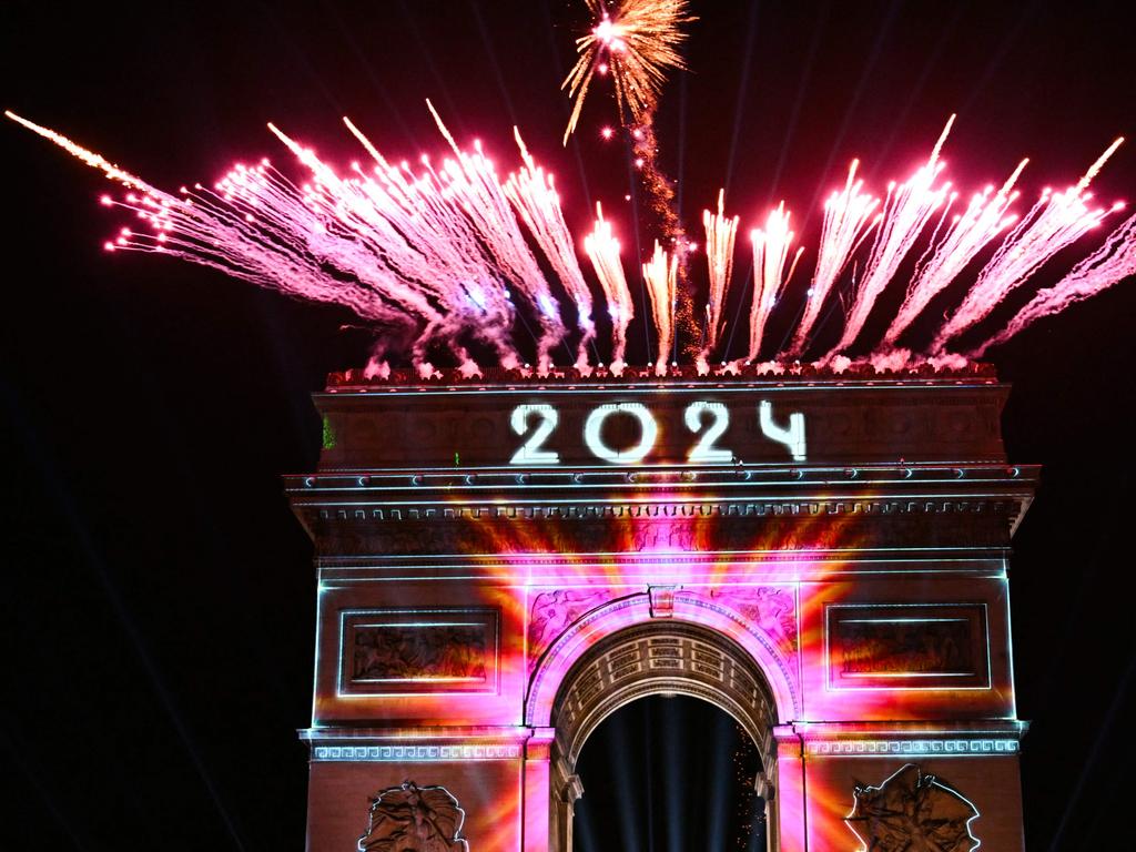 The Arc de Triomphe lights up. Picture: AFP