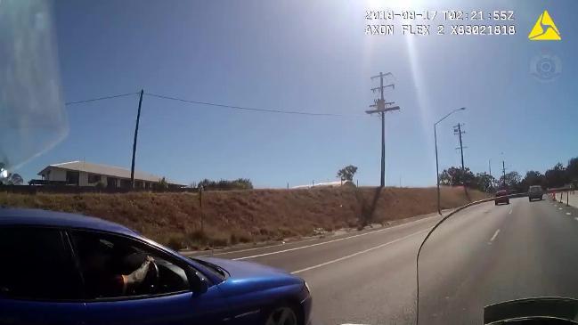 RAW: Qld man tries to run cop off road