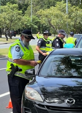 Police conducting roadside breath tests in Southport