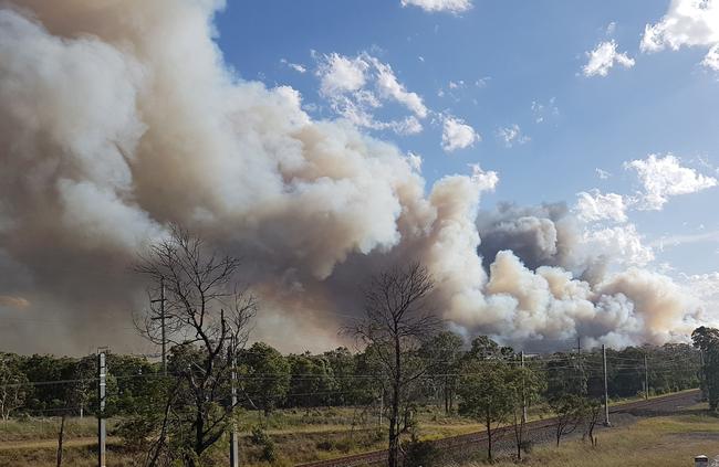 Photo on Sunday showing the fire at Wattle Grove. Picture: AFP Photo/Carlos Coutinho