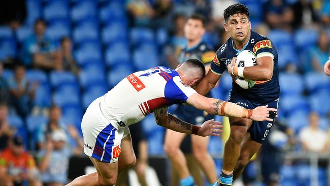 GOLD COAST, AUSTRALIA – SEPTEMBER 25: Tyrone Peachey of the Titans is tackled by Bradman Best of the Knights during the round 20 NRL match between the Gold Coast Titans and the Newcastle Knights at Cbus Super Stadium on September 25, 2020 in Gold Coast, Australia. (Photo by Matt Roberts/Getty Images)