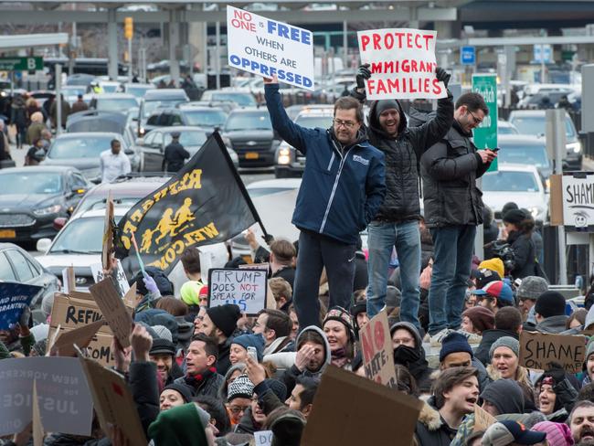 Protesters gather at JFK International Airport's Terminal 4 to demonstrate against President Donald Trump's executive order on January 28. Picture: Bryan R. Smith/AFP