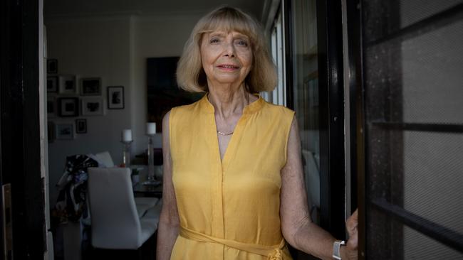 Woollahra resident Jo Poyter watched on a flames erupted from a car that was set alight in an anti-Semitic attack early Wednesday morning. Picture: Liam Mendes