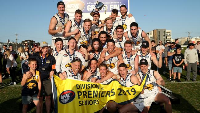 Whittlesea players celebrate their 2019 NFL Division 2 grand final victory. Picture: Hamish Blair