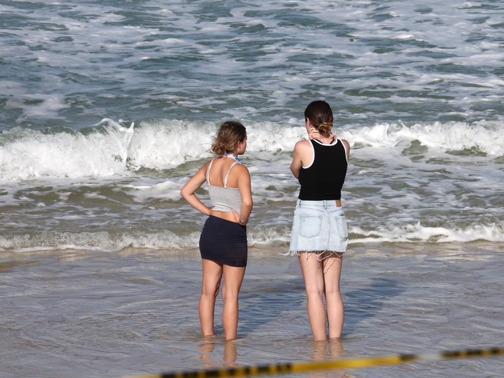 Hundreds of people have gathered at Bribie Island for a vigil to honour 17-year-old shark attack victim Charlize Zmuda. Picture: David Clark