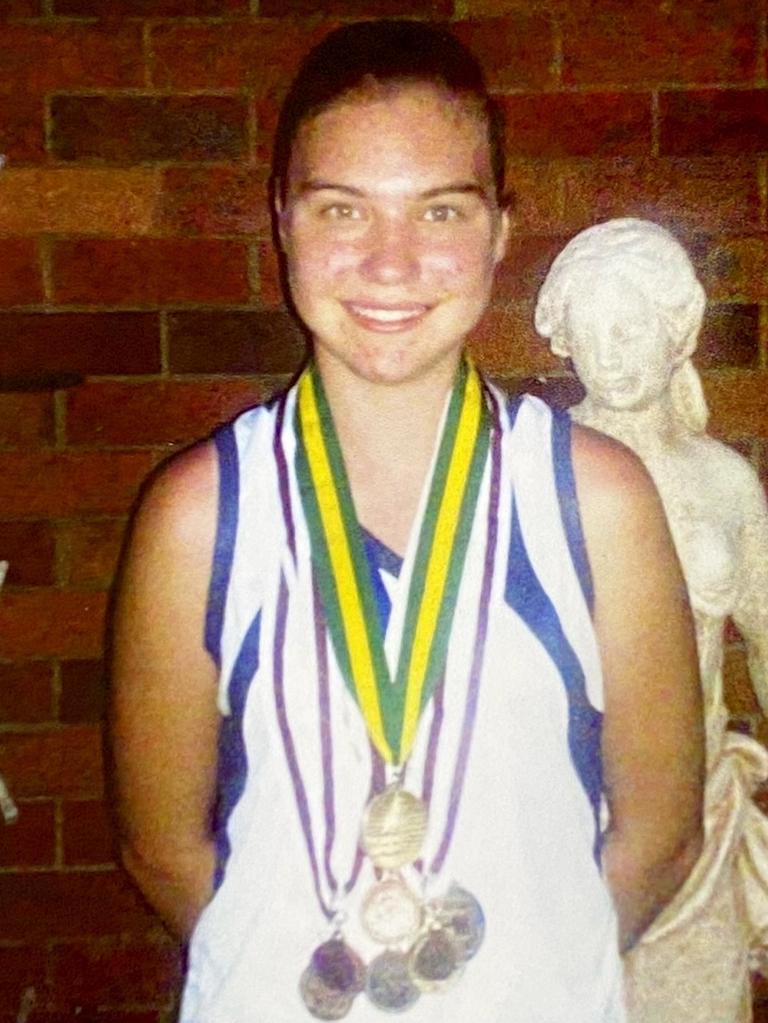 Blake wears a haul of medals after dominating as a teen.