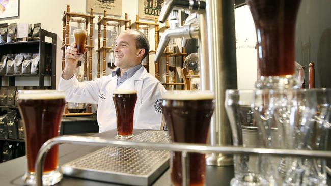 Danes head trainer Jon Saroglu with the nitro-brewed coffee. Picture Troy Snook.