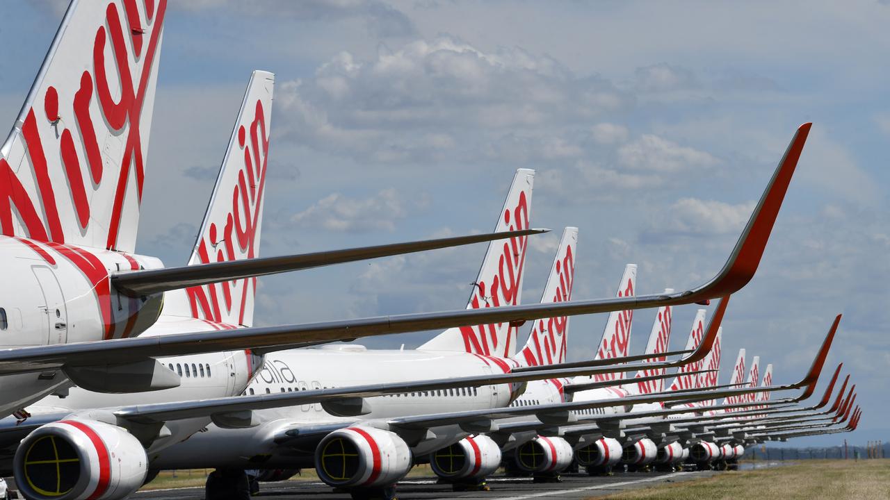 Currently, Virgin Australia has just one plane in the air each day, leaving 129 grounded. Picture: Darren England/AAP