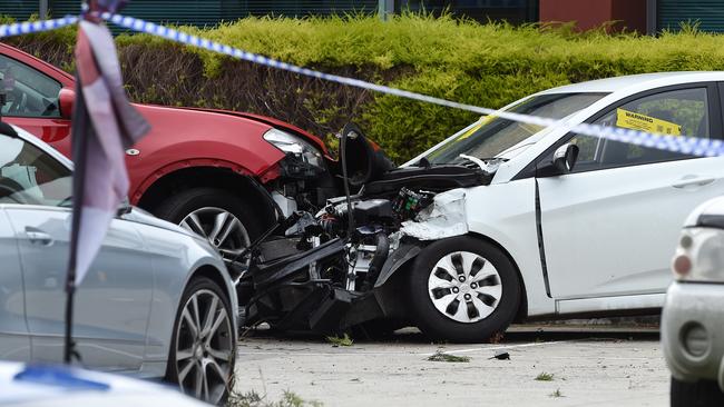 The out-of-control 4WD also damaged a number of parked cars before it ended up on its side. Picture: Steve Tanner