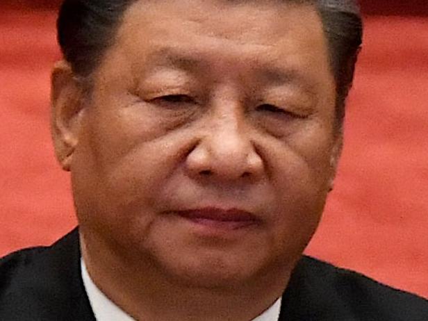 TOPSHOT - Chinese President Xi Jinping attends the commemoration of the 110th anniversary of the Xinhai Revolution which overthrew the Qing Dynasty and led to the founding of the Republic of China, at the Great Hall of the People in Beijing on October 9, 2021. (Photo by Noel Celis / AFP)