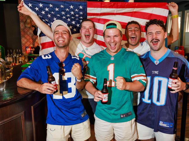 Daily Telegraph. 12, February, 2024.Damien VickovichThomas ComerfordHugo Vlachos Adrian Peronace andNick North at Hotel CBD Hotel, Sydney, watching The Superbowl today.Picture: Justin Lloyd.