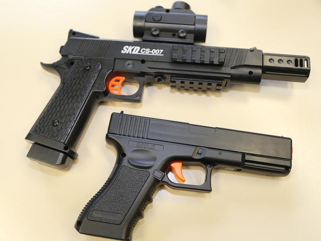 Pictured is a Gel Blaster replica of a 1911 Race Gun (top) and a Gel Blaster replica Glock. PHOTO: Bronwyn Wheatcroft