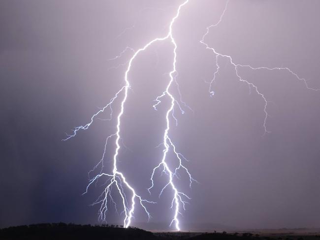 WHAT A SHOT: Photographer Grant Rolph snapped this amazing shot of lightning outside Toowoomba last night during the thunderstorms.