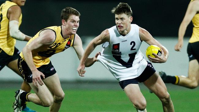 Sam Walsh of Vic Country evades a tackle against Western Australia during the national championships. Picture: Daniel Pockett/AFL Media/Getty Images