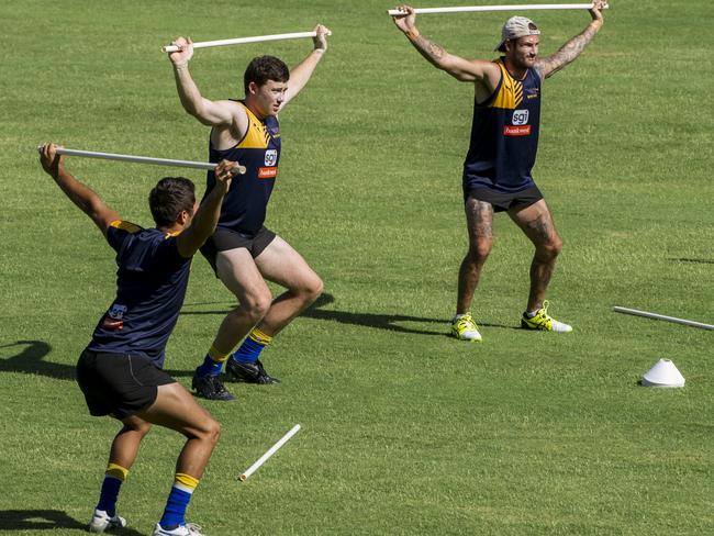 West Coast Eagles players during an open training session at Subiaco Oval on Wednesday. Pictured is Malcolm Karpany, Jeremy McGovern and Chris Masten. Picture: Matthew Poon
