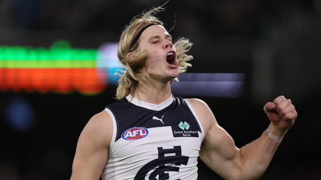 ADELAIDE, AUSTRALIA - MAY 30: Tom De Koning of the Blues celebrates a goal during the 2024 AFL Round 12 match between the Port Adelaide Power and the Carlton Blues at Adelaide Oval on May 30, 2024 in Adelaide, Australia. (Photo by James Elsby/AFL Photos via Getty Images)