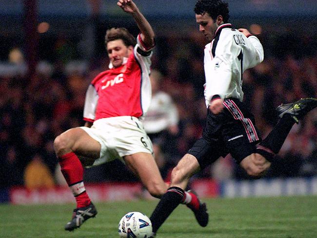 Giggs scores his most famous goal, against Arsenal in the 1999 FA Cup semi-final replay.