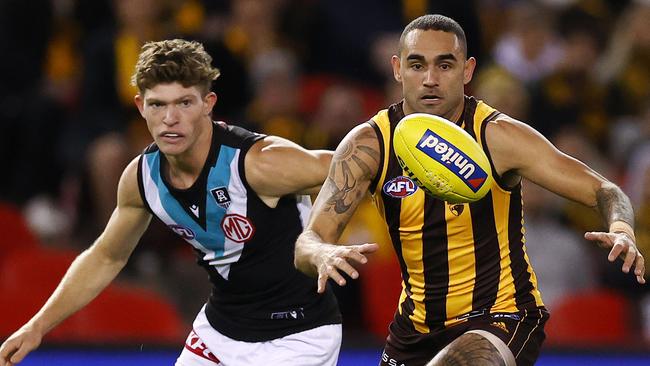 Burgoyne (R) made his AFL debut with Port Adelaide in 2002. Pic: Michael Klein