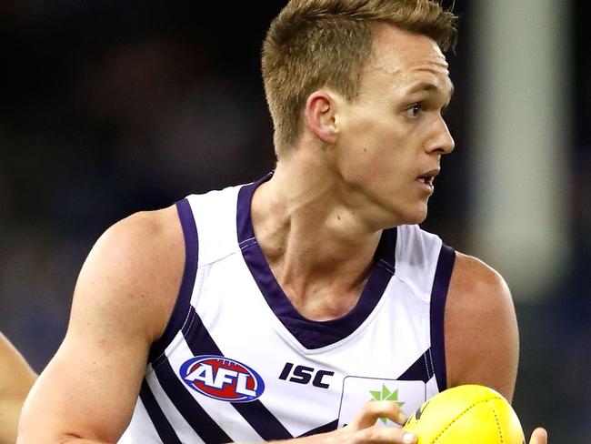 MELBOURNE, AUSTRALIA - JULY 09: Debutante, Ryan Nyhuis of the Dockers in action during the 2017 AFL round 16 match between the North Melbourne Kangaroos and the Fremantle Dockers at Etihad Stadium on July 09, 2017 in Melbourne, Australia. (Photo by Adam Trafford/AFL Media/Getty Images)