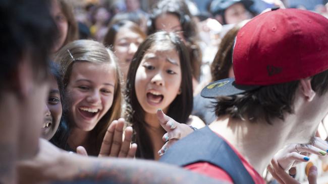 Close to the stars: Justice Crew members meet their fans. Picture: Phil Rogers