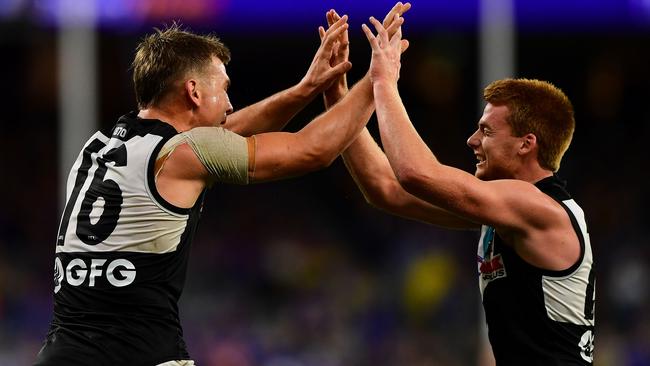 Ollie Wines celebrates a goal with Willem Drew. Picture: Daniel Carson/AFL Media/Getty Images