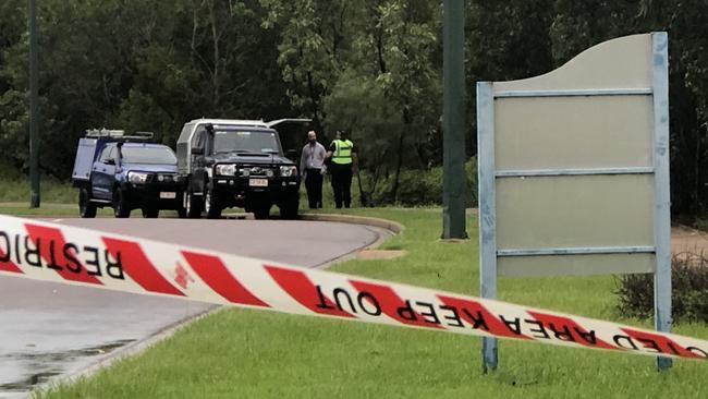 Police established a crime scene after the body was found submerged in a small creek in Darwin’s northern suburbs